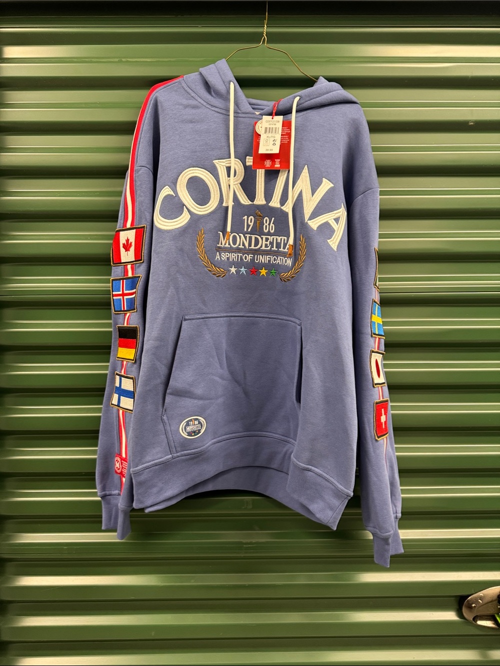 Mondetta Light Blue Corvina Crewneck with Flag Sleeve Patches